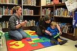 Learning to use scissors at the Moses Lake Library