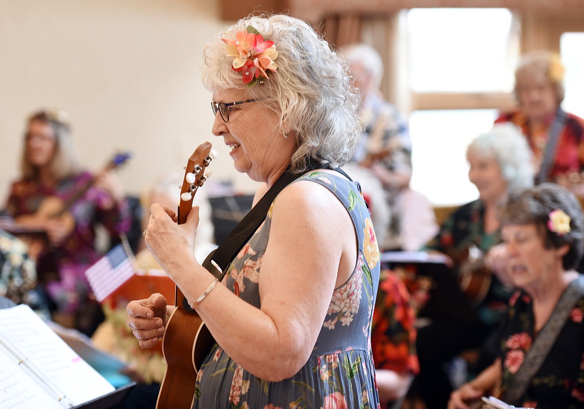 PEGGY GRAFE, leading the Kaz-Uke-Eeeef players as they serenade the residents at Immanuel Lutheran Communities Monday, April 17, in Kalispell.
(Brenda Ahearn/Daily Inter Lake)