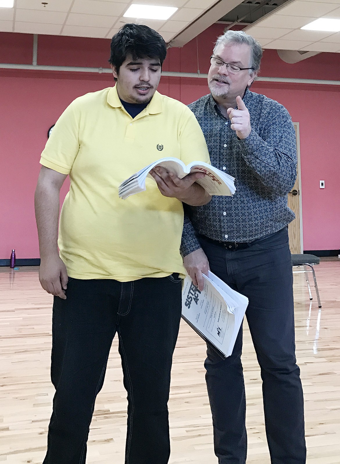 Columbia Falls High School student Estevon Torres works with Broadway veteran actor Mike Eldred during a rehearsal for  &#147;Sister Act.&#148;