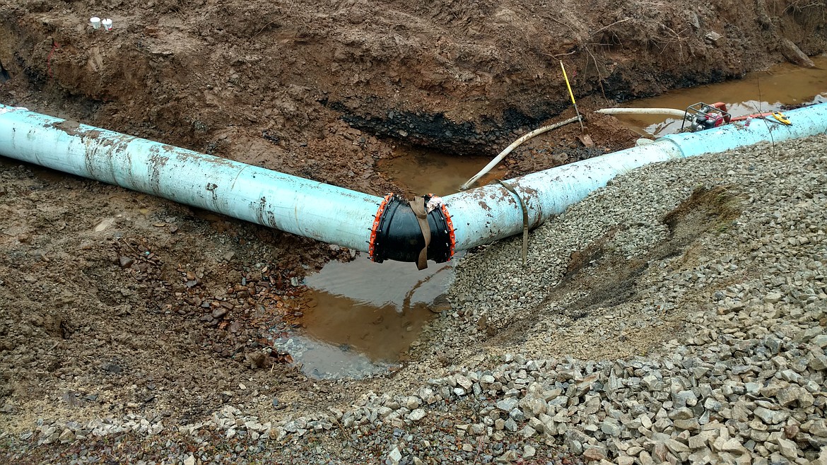 Instead of running the new pipe back out under the river, the contactors and engineers ran it toward the bike trail before it connects with the old, existing system.