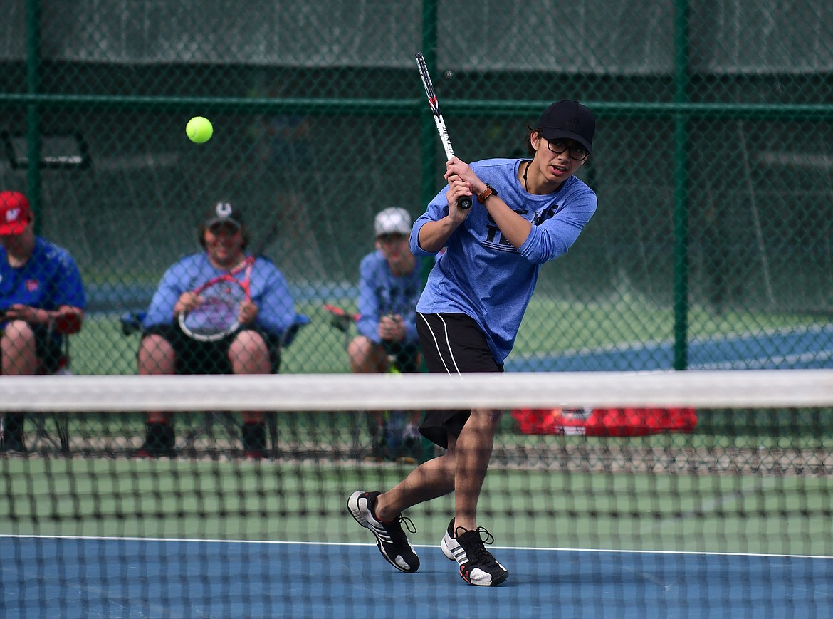 Patrick Tillman returns serve against Flathead last week.