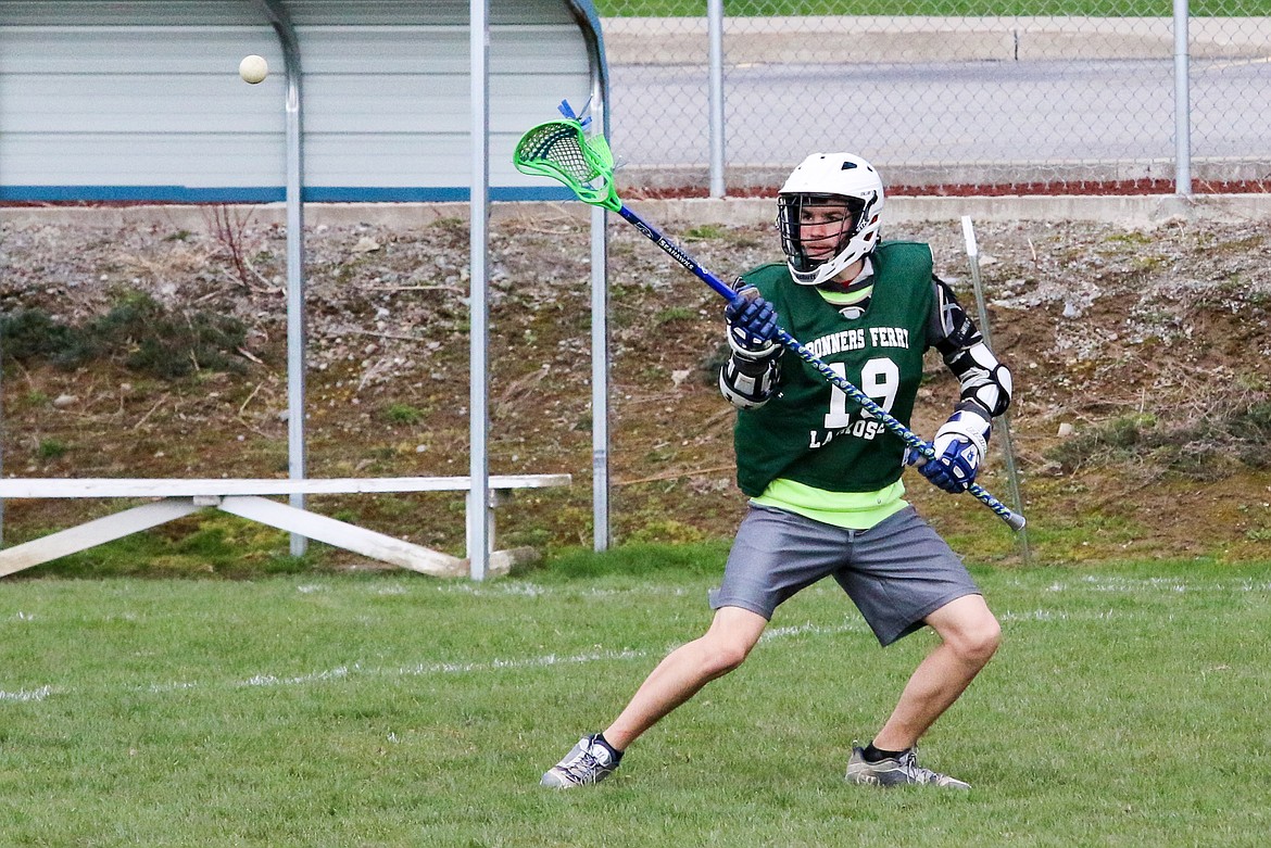 &#151;Photo by MANDI BATEMAN
John Parker receives a pass during practice last Monday.