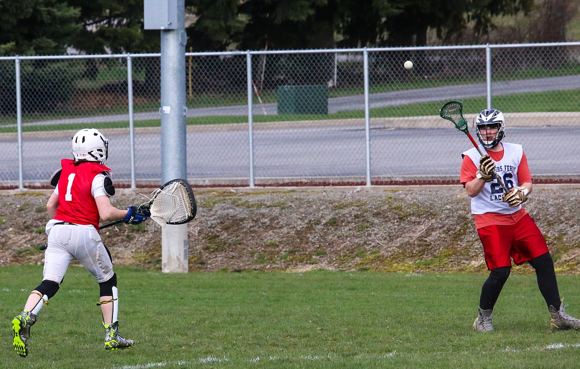 &#151;Photo by MANDI BATEMAN
Riley Delaney (right) gets ready to take a shot on goalie, Gabe Eggy (left) during practice.