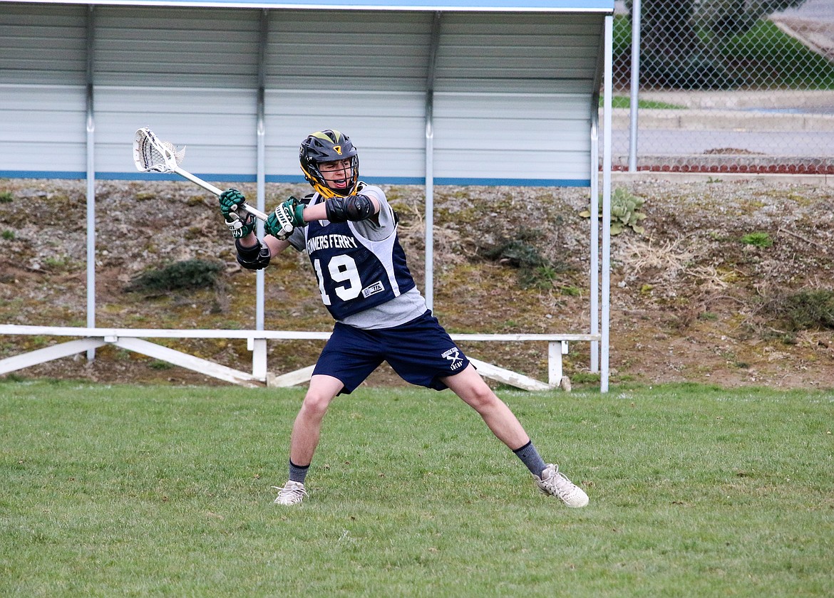 &#151;Photo by MANDI BATEMAN
Practice day: Team Captain, Will Mulvaney takes a shot at the goal.