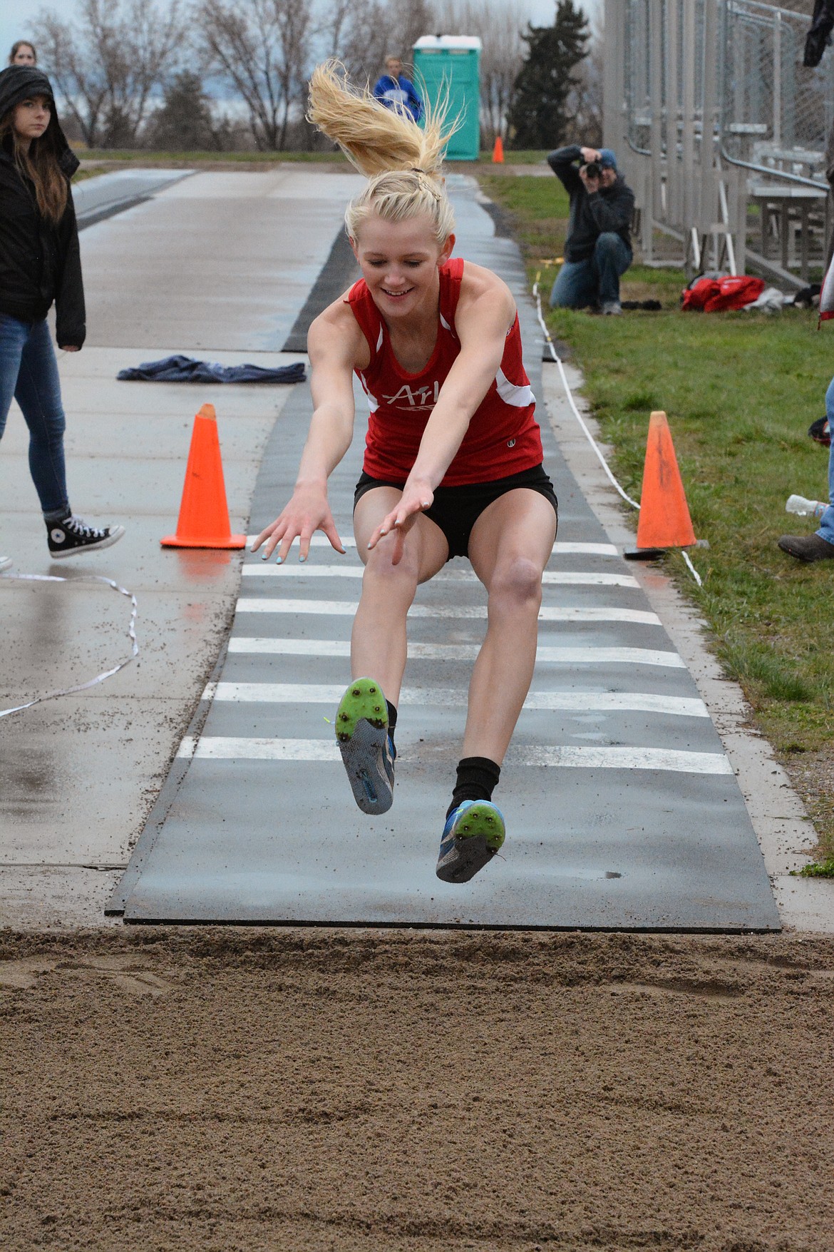 ARLEE WARRIOR Carly Hergett captured three events including the 100-meter hurdles, long jump, and triple jump Thursday afternon at the Dave Tripp Memorial Track Invitational at Polson High School. (Jason Blasco/Lake County Leader)