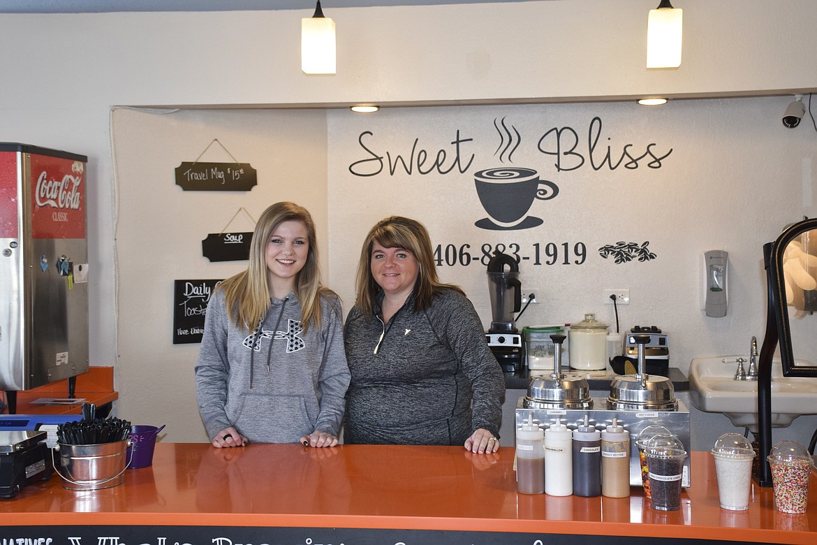 Sweet Bliss owner Chanel Lake (right) stands behind the counter with barista Shelby Korpi on Monday morning. (Brett Berntsen/Lake County Leader)