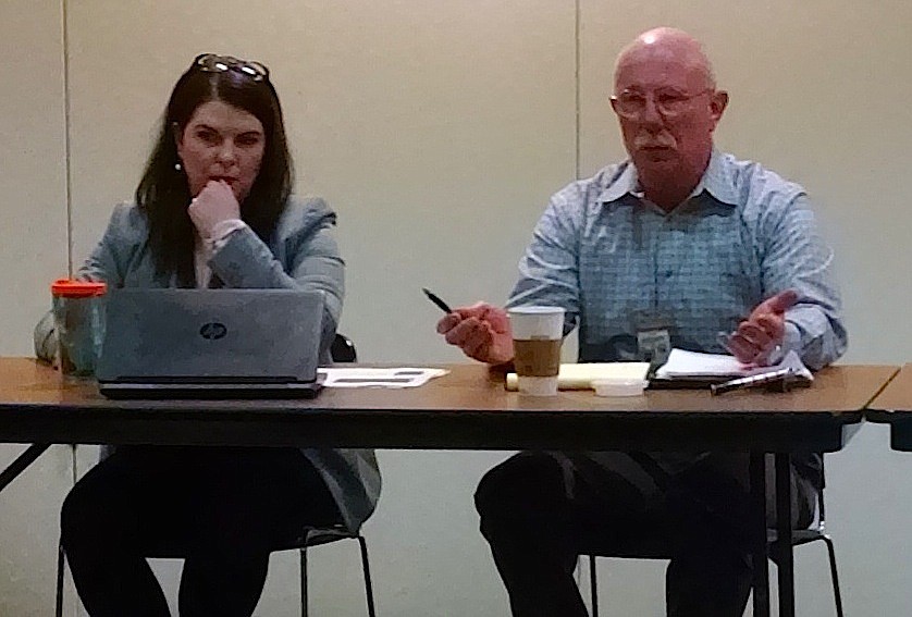 BRIAN WALKER/Press
Undersheriff Dan Mattos discusses budget items to Kootenai County elected officials and commissioners on Wednesday at the county&#146;s Administration Building. Human Resources Director Skye Reynolds is on the left.