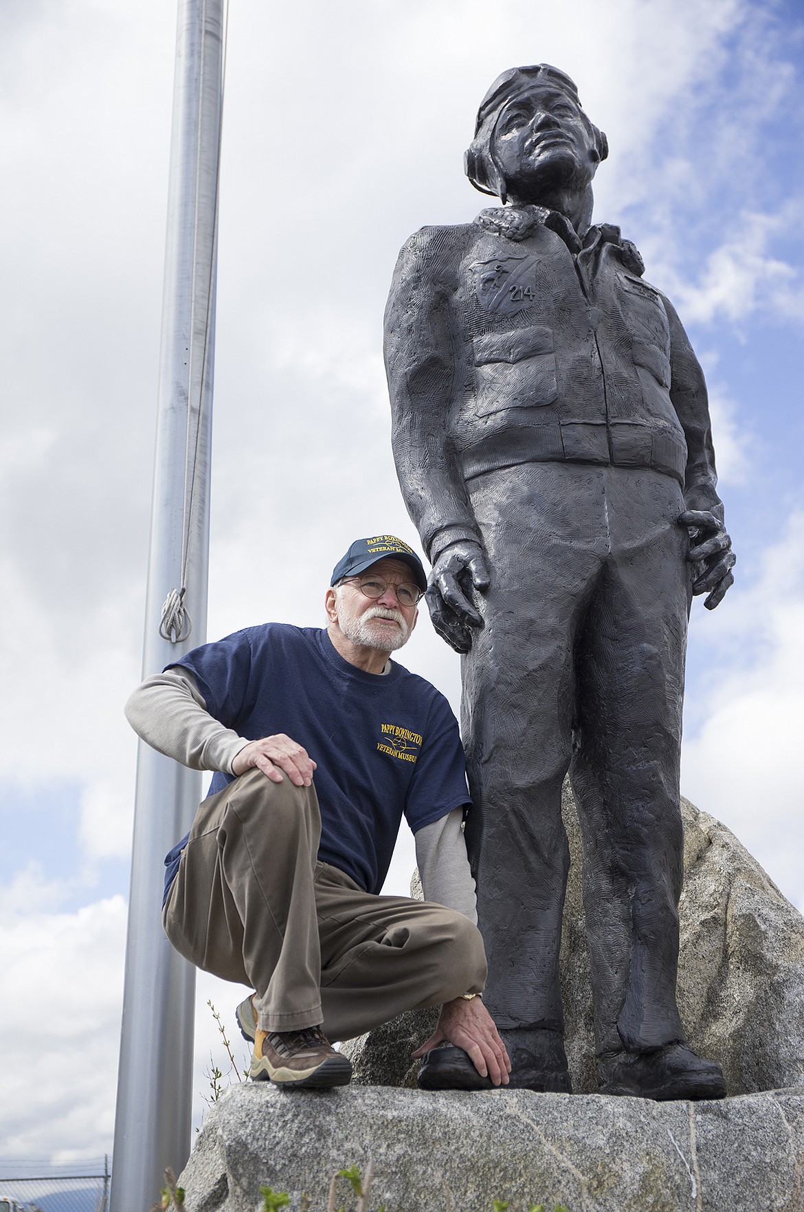 LISA JAMES/Press
Richard Le Francis poses with the statue of local World War II hero Pappy Boyington at the Pappy Boyington Airfield in Hayden. Le Francis, who started the Pappy Boyington Museum at the airport in 2010, was also a co-sculptor of the statue. The museum lost its lease this year and is looking to relocate to a larger space where the museum will expand into the Rutan Air and Space Center, a world-class education center.