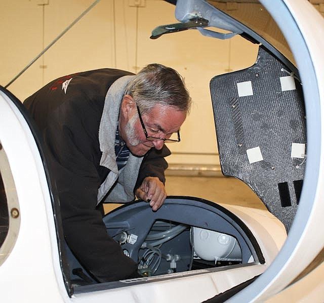 Photo by MIKE SATREN
Burt Rutan performs pre-prep on Sunday, April 23, 2017, for a taxi-test of an airplane with new tricycle tretractable landing gear.