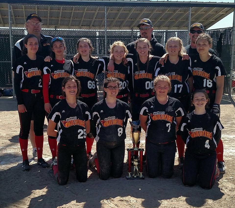 Courtesy photo
The Northwest Wildfire 14-and-under girls softball team took second place at the Moses Lake Rattler Roundup May 6-7, going 4-1. In the front row from left are Skylar Burke, Hope Bodak, Abby Gray and Chloe Flechsing; second row from left, Aubree Chaney, Alexis Mitchell, Phoebe Schultze, Allison Russum, Sarah Salyer, Madison McDowell and Faith Boyle; and back row from left, coach Mike McDowell, coach Cory Bodak and coach Gary Schultze. Not pictured is coach Scott Flechsing.