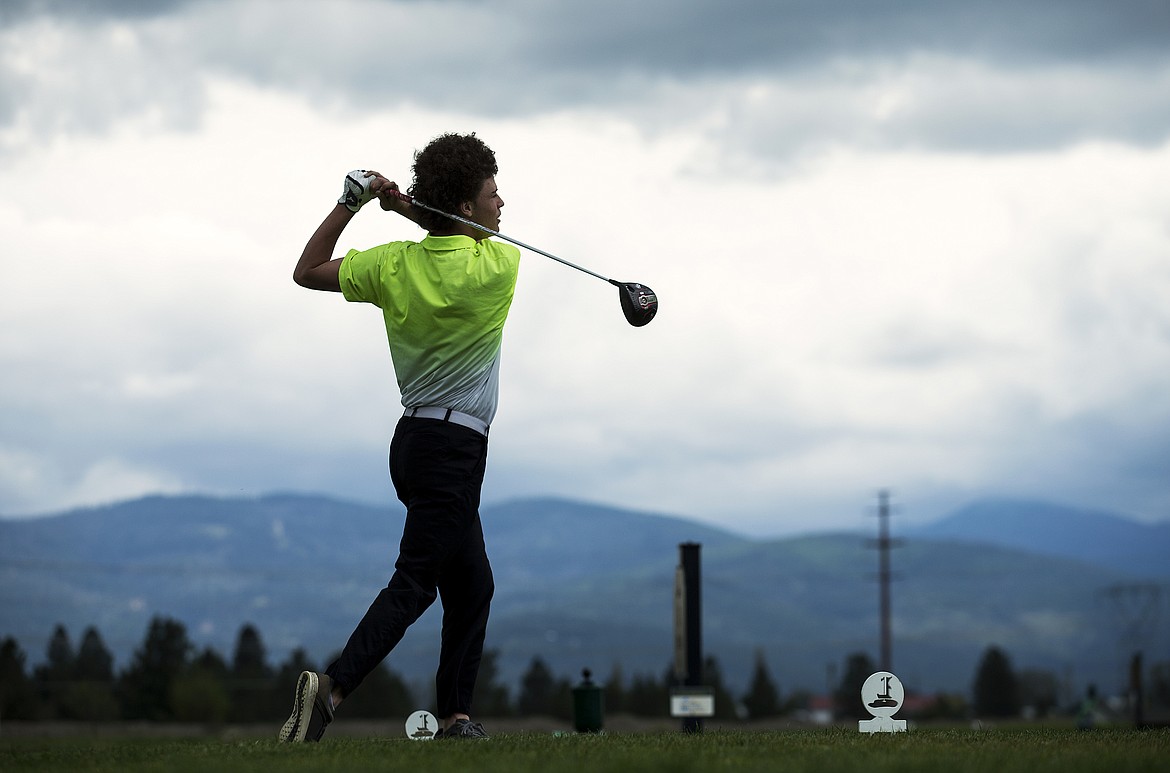 LOREN BENOIT/PressDylan Knight of Lakeland High School watches his drive off hole 1 in the Lakeland Invitational at The Links Golf Course Friday morning.