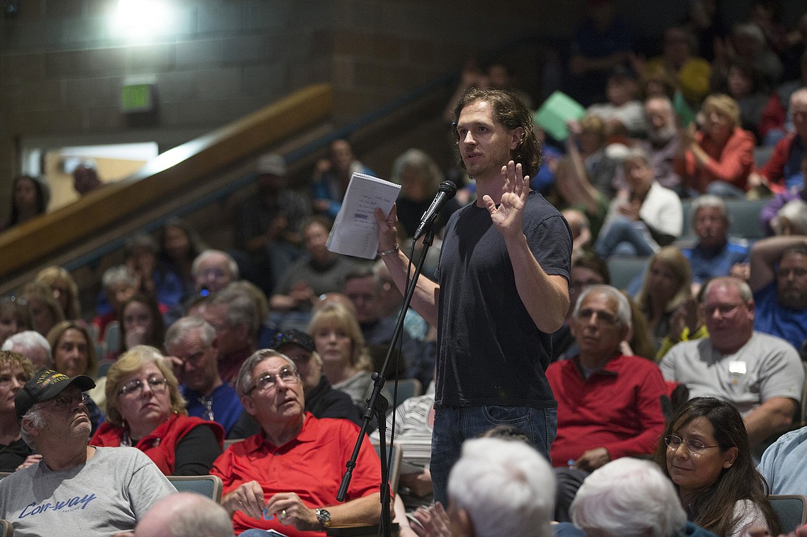 LISA JAMES/PressTeuvo Orjala, one of the founders of Indivisible North Idaho, talks about unity as he thanks Idaho Congressman Raul Labrador, (R), for hosting the town hall at Lake City High School Friday night.