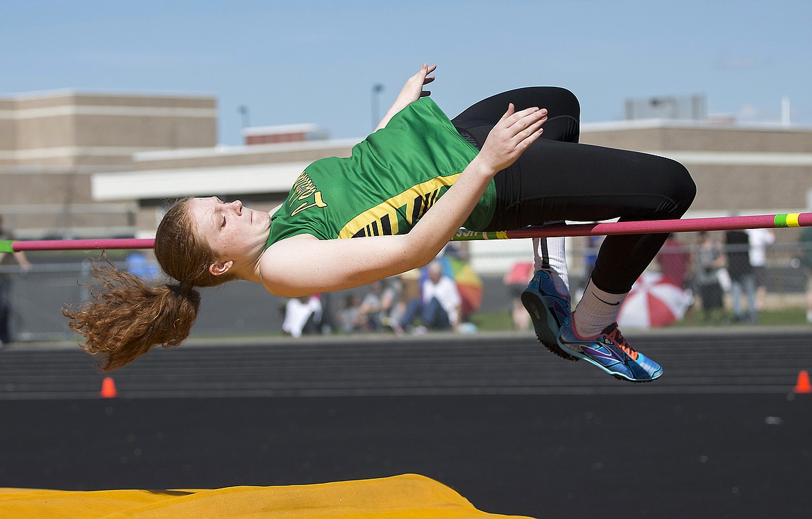 LISA JAMES/Press
Madeline Kime of Lakeland clears the bar while competing in the high jump at Post Falls High School on Thursday.