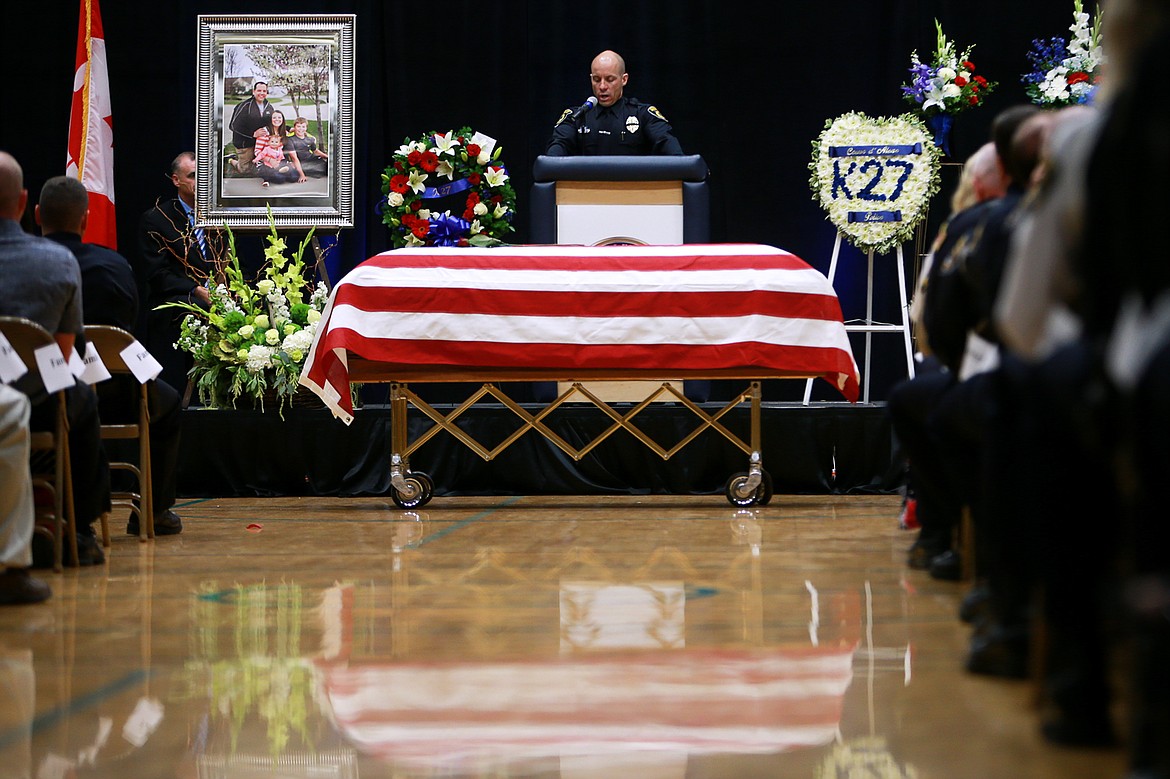 KRISTEN McPEEK/Press file
Detective Johann Schmitz was a speaker at the funeral of Sgt. Greg Moore on May 9, 2015, at Lake City High School. Schmitz was a dear friend and colleague of Moore&#146;s.