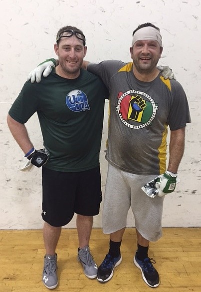 Eric Plummer, above right, and Declan Plummer, below left, each won titles last weekend at the Idaho State Handball Championships in Boise. Eric beat Carson Taysom, a former College of Idaho pitcher and up and coming handball player from Pocatello, in two straight games to win the Open Division singles. Declan won the C singles, but more importantly, got seven matches of singles and doubles in during a busy weekend. Sandpoint&#146;s Ryan Luttmann also competed, losing in the semis of the Open Doubles after a controversial call at 20-20 went against him and his partner from Boise. Luttman was serving at 20-20 after dropping the first game, and when a return that had no chance of making the front wall hit Luttmann, referee Eddie Garcia inexplicably called for a replay. The front of the state T-Shirt, pictured below, honors Boise&#146;s Thad Lewis and Sandpoint&#146;s Jim Lovell, each of whom was a well-liked part of the Idaho handball community who passed away recently.