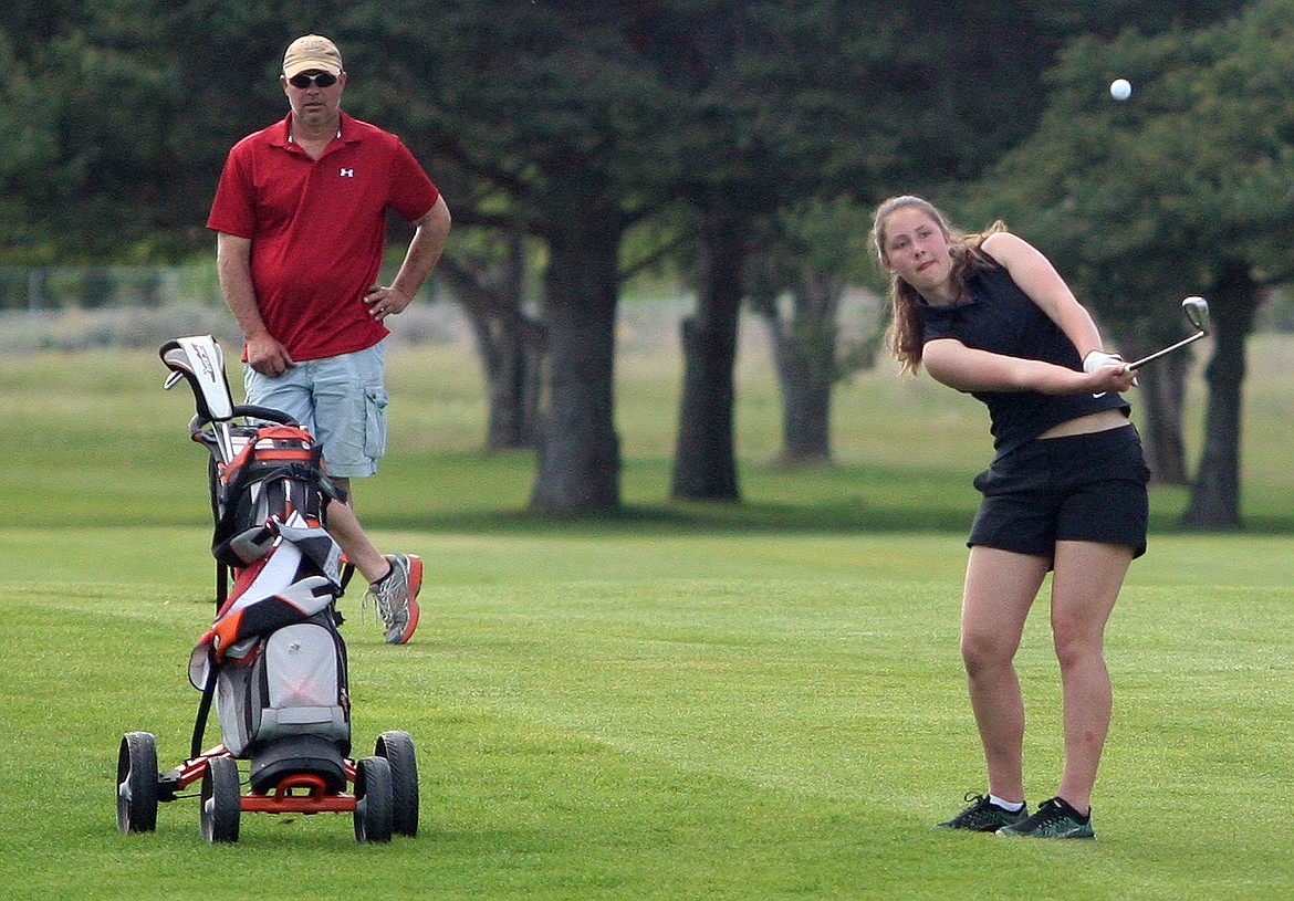 Rodney Harwood/Columbia Basin Herald
Ephrata's Isabel Buchert hits her approach into the sixth green Thursday afternoon at the CWAC girls golf tournament at Lakeview Golf &amp; Country Club in Soap Lake.