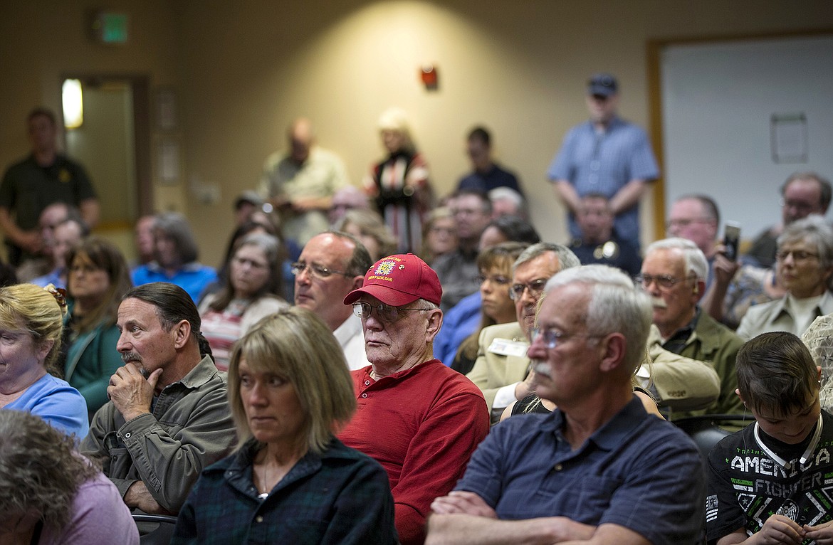 LISA JAMES/Press
A strong showing of local citizens listen to arguments for and against proposed changes to Citylink bus routes and fares, as well as the building of a new transit center at Riverstone, during a Kootenai County Comissioners hearing Tuesday night.