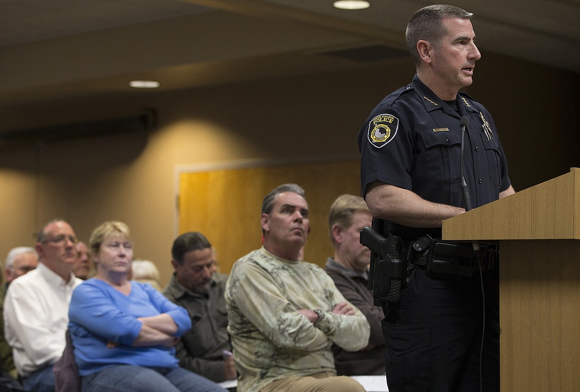 LISA JAMES/PressCoeur d'Alene Police Chief Lee White reports their findings about bus activity at a hearing Tuesday night for proposed changes to Citylink bus routes and fares and the building of a new transit center at Riverstone.