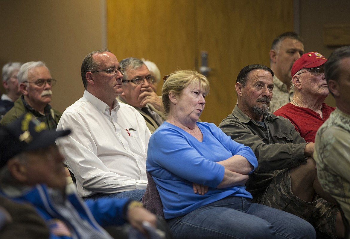 LISA JAMES/Press
Audience members listen to arguments for and against proposed changes to Citylink bus routes and fares, as well as the building of a new transit center at Riverstone, during a Kootenai County Comissioners hearing Tuesday night.