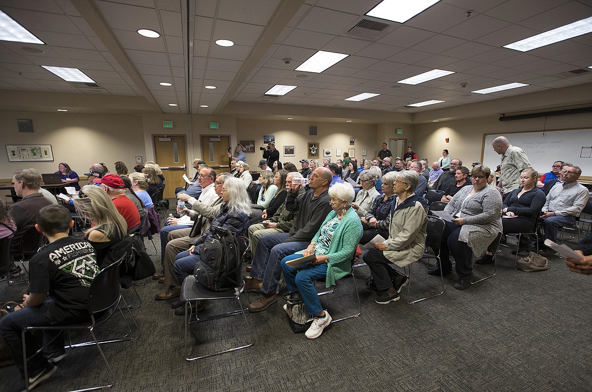 LISA JAMES/PressA strong showing of local citizens listen to arguments  for and against proposed changes to Citylink bus routes and fares, as well as the building of a new transit center at Riverstone, during a Kootenai County Comissioners hearing Monday night.