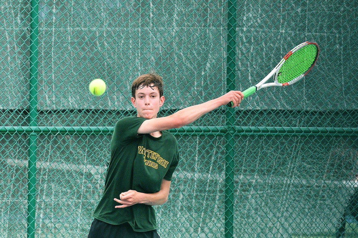 Eric Holdhusen returns the ball during a match Saturday at Flathead Valley Community College.