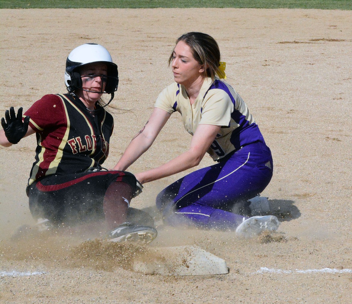 POLSON PIRATES second baseman Kaelyn Smith tags a Florence runner in the game against Florence at the Frenchtown Invitationals Saturday at Frenchtown High School. (Jason Blasco/Lake County Leader)