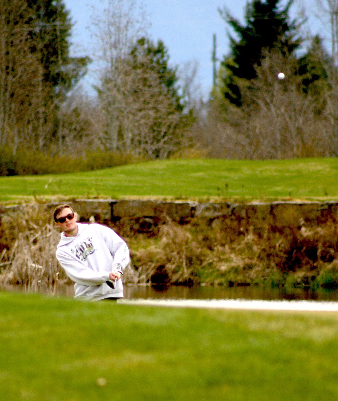 (Photo by ERIC PLUMMER)
Sandpoint junior Nick Crowley shot a 79 on Monday at the Idaho Club, the best round of the season for the Bulldog boys.