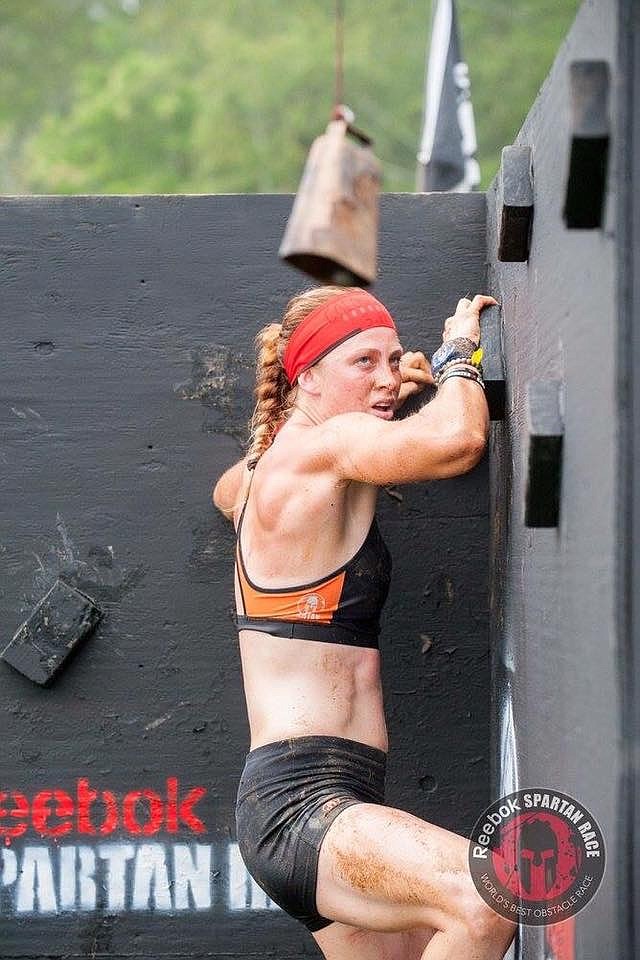 Courtesy photo
Former North Idaho College softball player Alyssa Hawley climbs a wall during the Emerald City Open, a Spartan U.S. Championship series race on April 22 in Snohomish, Wash.