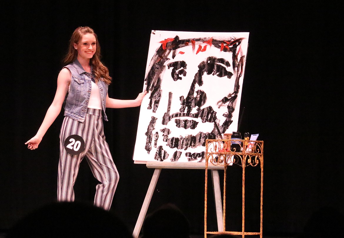 Photo by MANDI BATEMAN
Ashlynn Rushing surprised audience during her Talent performance, creating a portrait upside down, then flipping it over at the end to reveal the true image.