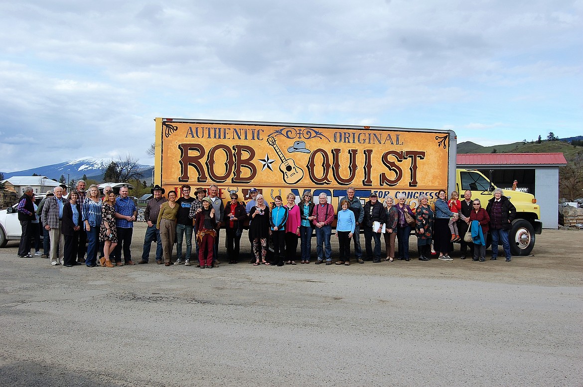 Members of the Mineral County Democratic Central Committee and Sanders County Democrats stand by a truck designed and painted by Rick Orozco of Arlee, during a fundraiser on Saturday evening. (Photo courtesy of Diane Magone)