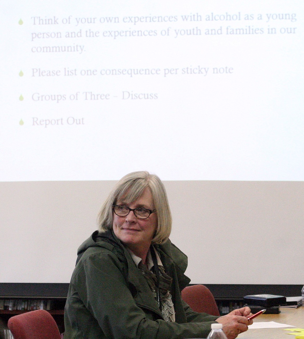 Troy Elementary School principal Diane Rewarts listens to the presentation during Tuesday night&#146;s event in Troy. (Photo by Elka Wood/TWN)
