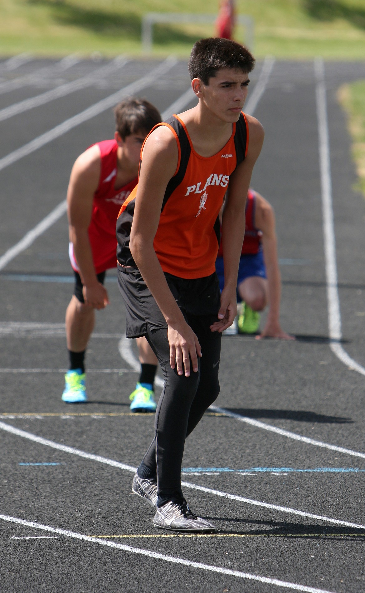 PLAINS TRACK runner Sinjin LeDeaux gets ready for a relay competition in a recent track meet.