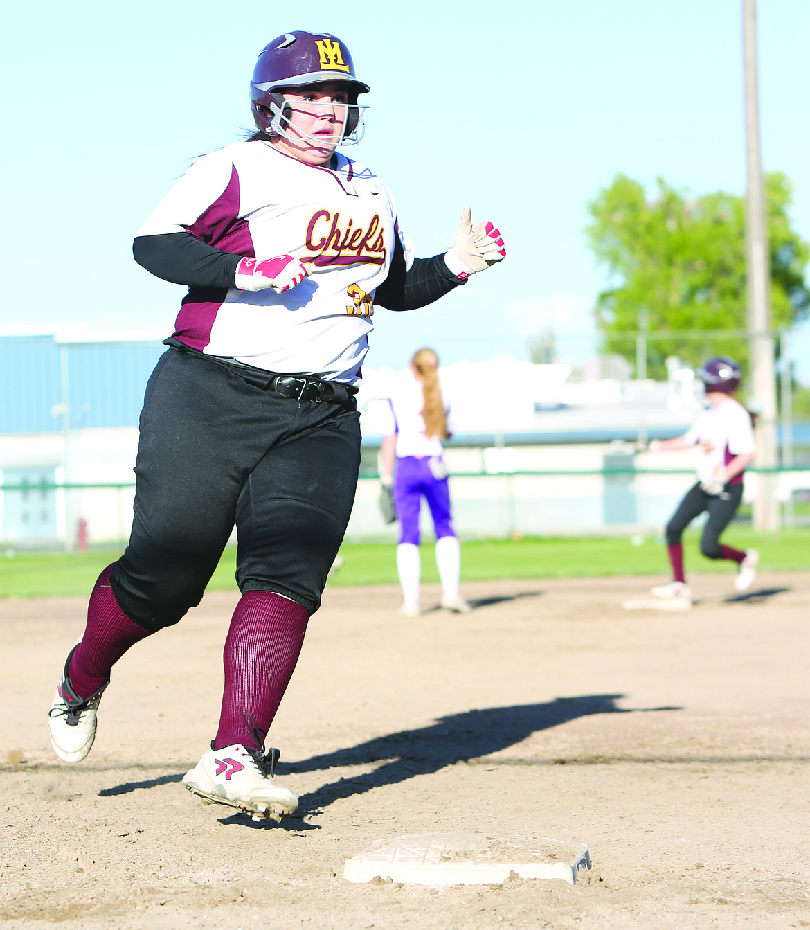 Connor Vanderweyst/Columbia Basin Herald
Moses Lake's Paige Valdez rounds third base and heads home for a run against Wenatchee.