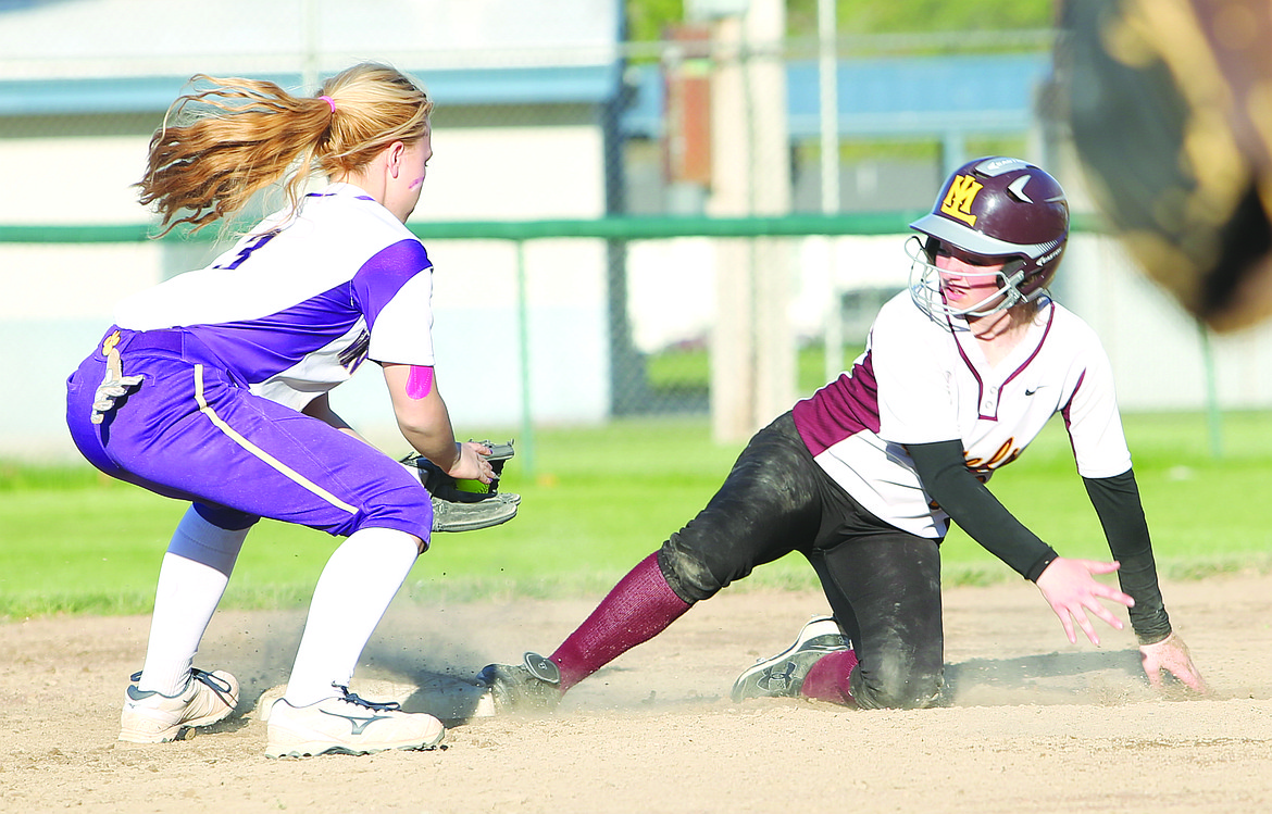 Connor Vanderweyst/Columbia Basin Herald
Moses Lake's Michelle Turner (right) slides into second base safely.