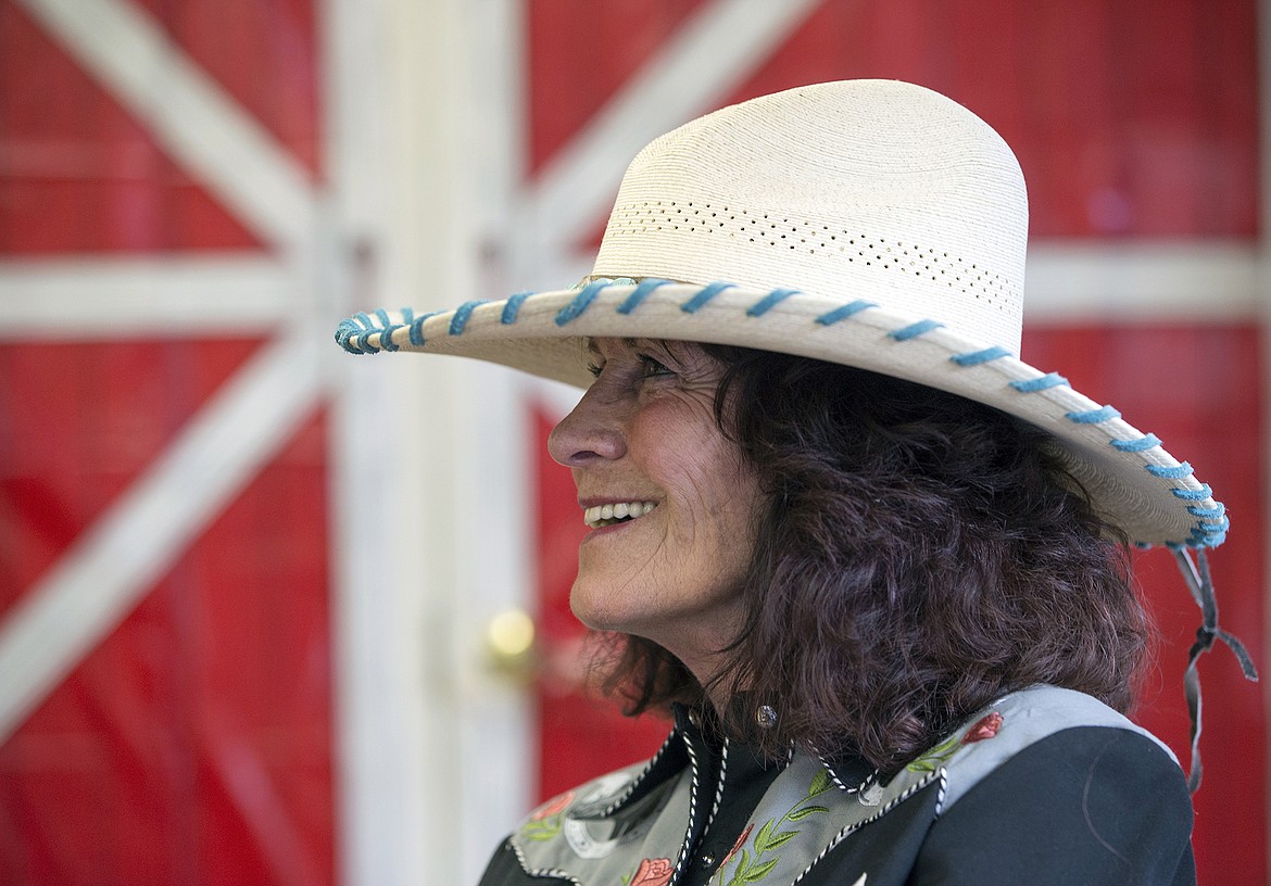 LISA JAMES/Press
Kathleen Falco listens to a reading of cowboy poetry during BAB&#146;s (Bayview Athol Belmont) Wild West Social at the community center in Bayview on Tuesday