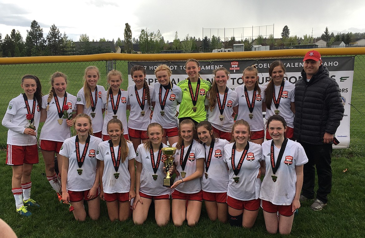 Courtesy photo
The Sting Timbers FC 02 girls soccer team won the 15U gold bracket at the Bill Eisenwinter Hot Shot Tournament last weekend. On Saturday, the Sting Timbers beat Storm FC G02 Showalter 2-0. Goals were scored by Riley Anderson and Geneva Bengtson assisted by Kameron Fisbeck. Alex Plucker had the shutout in goal. Also on Saturday, Sting tied Boise Nationals Timbers 02 Red 0-0. In the semifinal game on Sunday, Sting tied Laurel Storm Purple 2002 1-1. Geneva Bengtson scored for Sting and Madyson Smith assisted. The game went into penalty kicks with Sting winning 3-0. PK goals were scored by Geneva Bengtson, Abbie Lyman and Grace Anderson-Mosher. Alex Plucker had 5 saves during the game and blocked all 3 penalty kicks from the Storm to win the game. In the championship game on Sunday afternoon, Sting beat Idaho Rush Nero 2-0. Sting goals were scored by Elizabeth Scarlett assisted by Abbie Lyman, and Geneva Bengtson assisted by Madyson Smith. In the front row from left are Maysen Deming, McKenzie Mattis, Grace Anderson-Mosher, Zoe Cox, Madyson Smith, Tate Hochberger and Sydney Harbison; and back row from left, Kiley Cutler, Riley Anderson, Madison Fain, Alexi Wilson, Abbie Lyman, Elizabeth Scarlett, Alex Plucker, Kameron Fisbeck, Cailyn Garza, Geneva Bengtson and coach Mike Thompson.