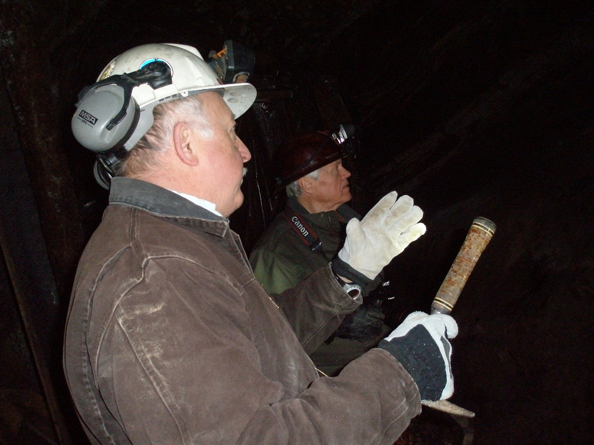 Golden Chest Mine owner Fred Brackebusch of Kellogg, left, and author Tony Bamonte take a tour of the mine in 2009 as Bamonte gathers information about the historic site. The Golden Chest, southeast of Murray, was located in 1883 and its claims were among some of the earliest ones during the gold rush.