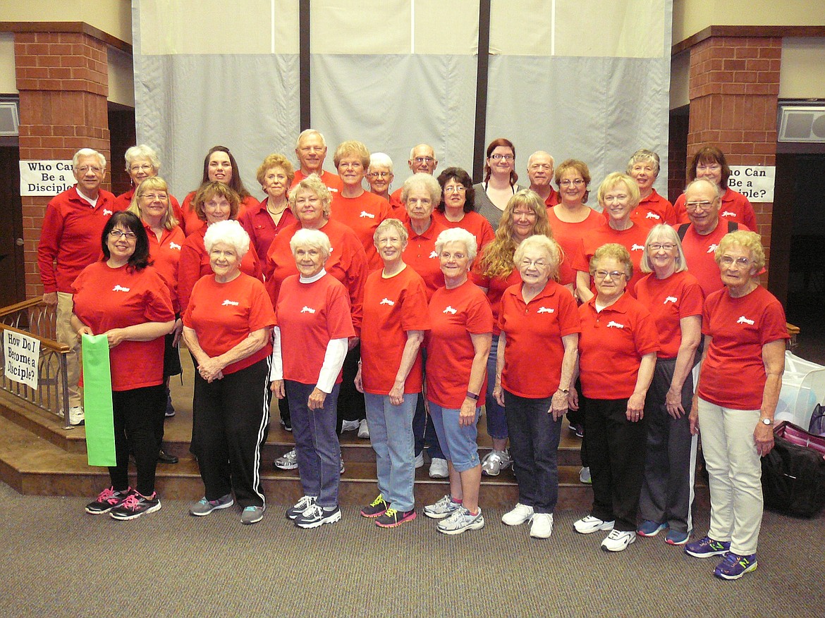 JERRY HITCHCOCK/Press
The Lake City chapter of Striders Inland Northwest poses before a recent workout session at Community United Methodist Church. The chapter will soon move to the Coeur d&#146;Alene City Park for workouts on Tuesday mornings.