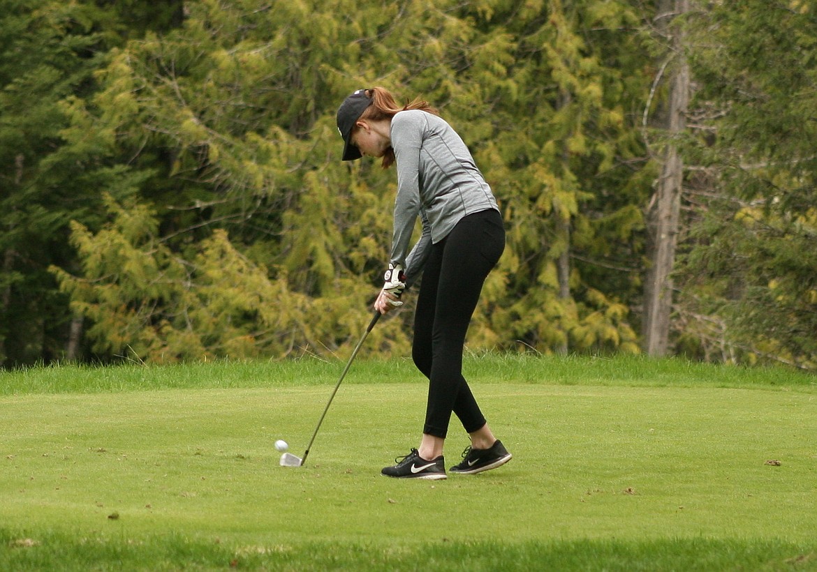 (Photo by ERIC PLUMMER)
Senior Nina McDonnell, pictured earlier in the season, fired an 87 on day one of the 4A state golf tournament in Idaho Falls.