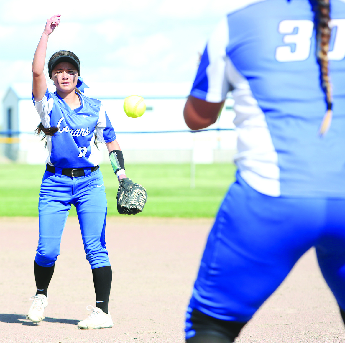 Connor Vanderweyst/Columbia Basin Herald
Warden second baseman Ashlyn Yamane flips the ball to first baseman Amanda Contreras for an out.