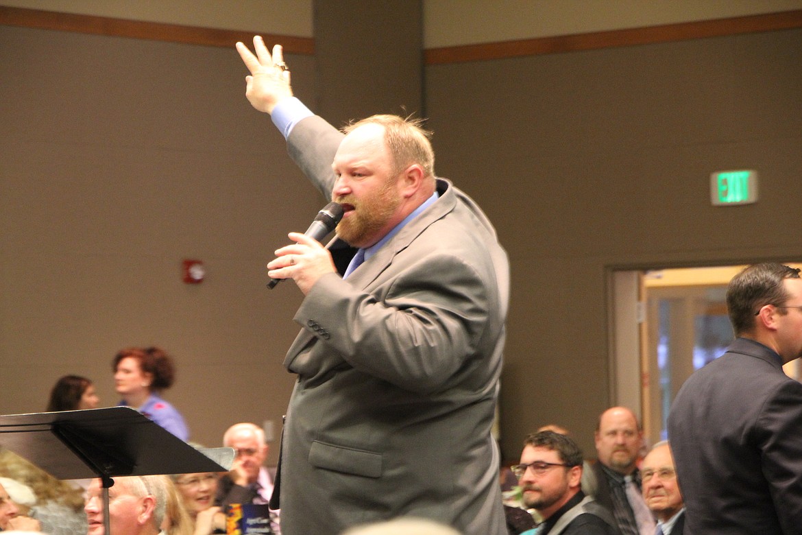 Courtesy photo
Chuck Yarbro Jr. works the crowd for the live auction at the 2016 Cellarbration. This year&#146;s event is Saturday.