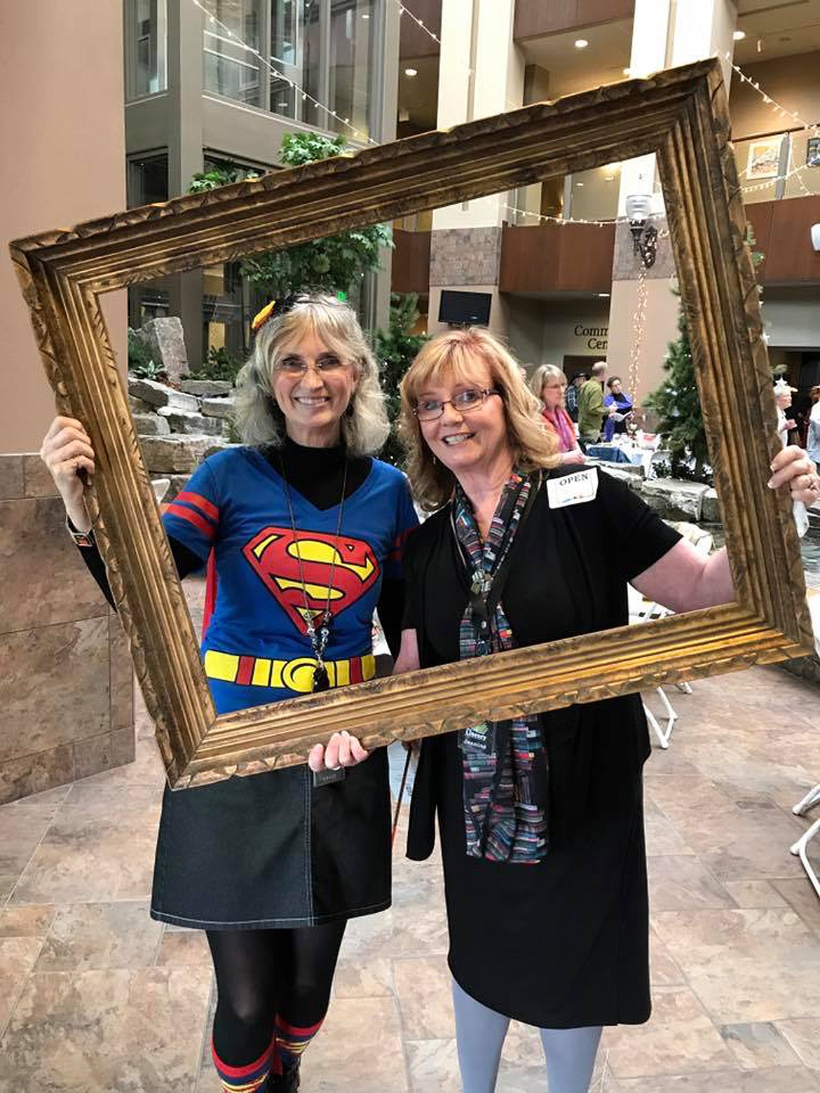 (Courtesy photo)East Bonner County Library District Library director Ann Nichols and Jeanine Asche, library board chairperson,
get their picture taken at Saturday's A Novel Night Gala, held to raise money for the East Bonner County Library District expansion project.