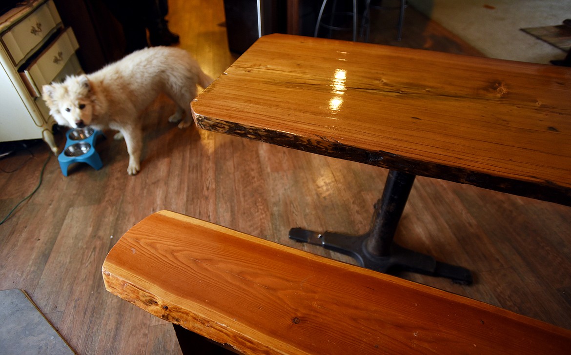 Jody Bakker has a table and bench he made from wood he had salvaged in his home near Echo Lake.(Brenda Ahearn/Daily Inter Lake)