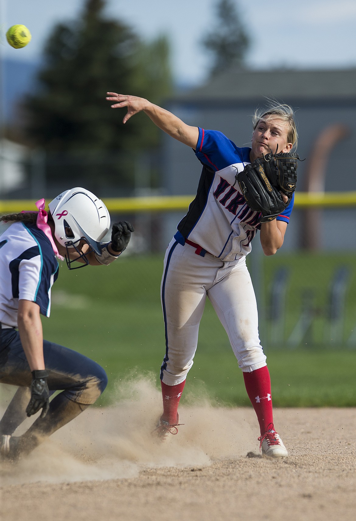 LOREN BENOIT/Press

Bailee Taylor of Coeur d&#146;Alene steps on the second base bag and throws to first in the 5A Region 1 semifinal game against Lake City High on Tuesday.