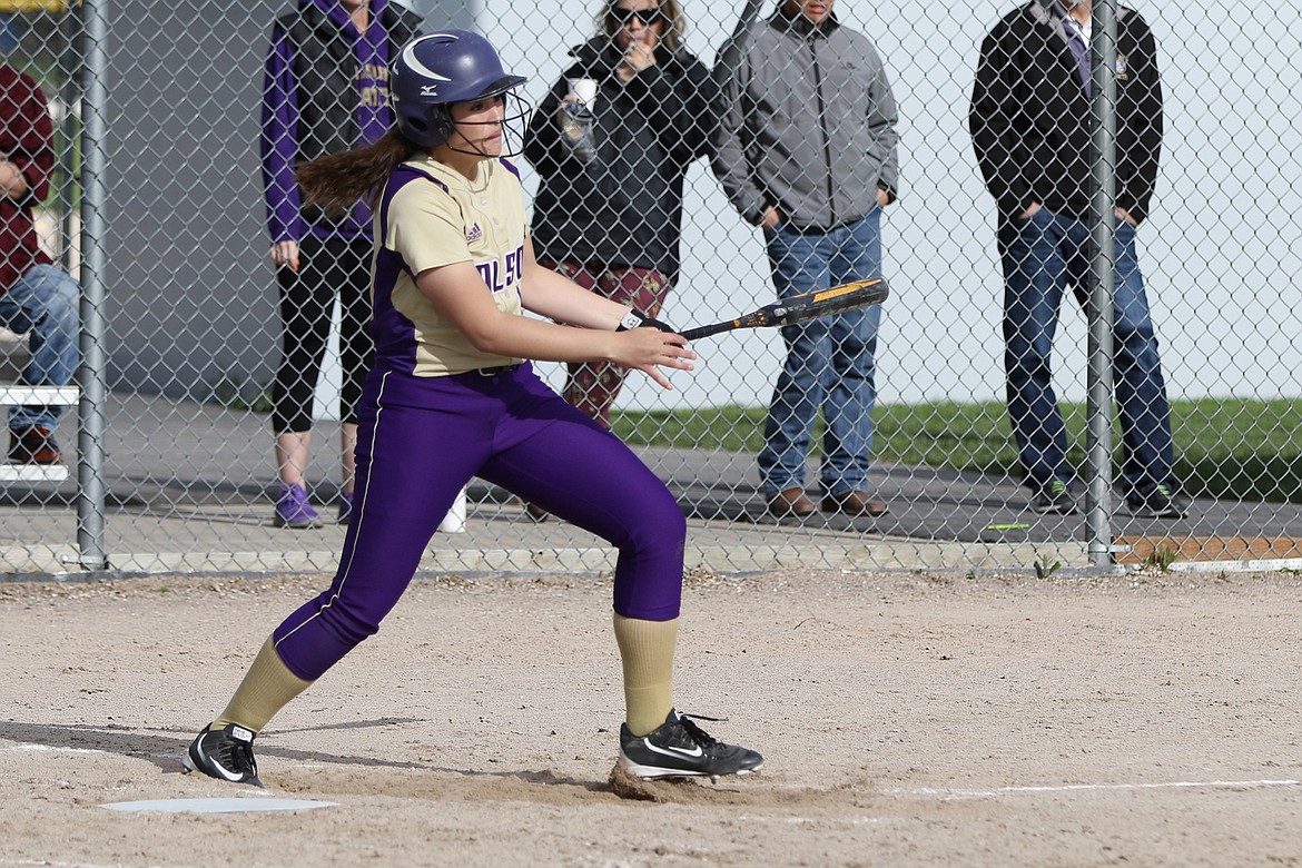 POLSON HITTER Haley Fyant drives a homerun off of Glacier pitcher Emma Shew in a recent game against Glacier. According to Lady Pirates' skipper Larry Smith Fyant's pitching and hitting was missed by Polson at the Butte Invitational. (photo courtesy of Bob Gunderson)