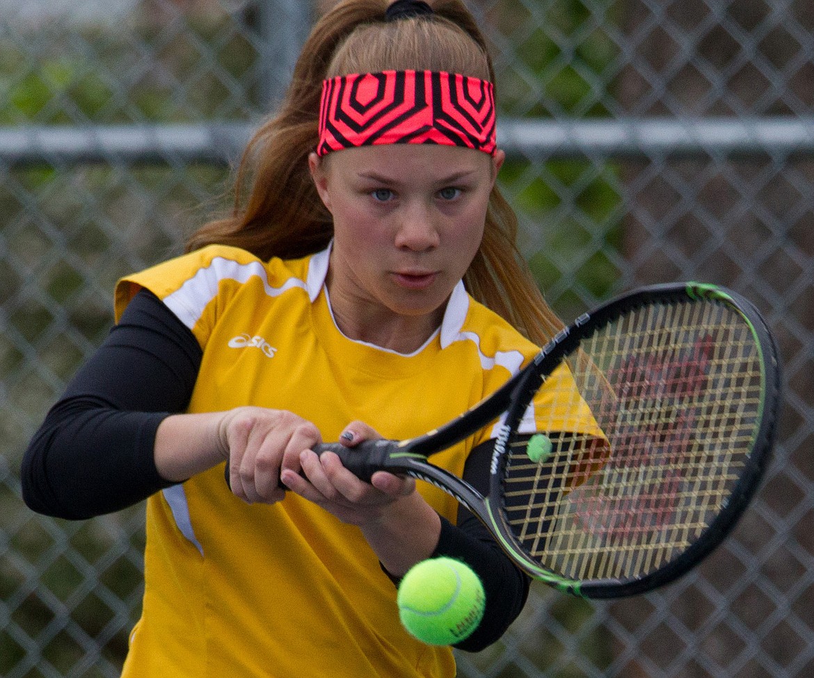 Libby High School's Isabelle **GETNAME* competes in a tennis divisional in Libby Friday, May 12, 2017. (John Blodgett/The Western News)