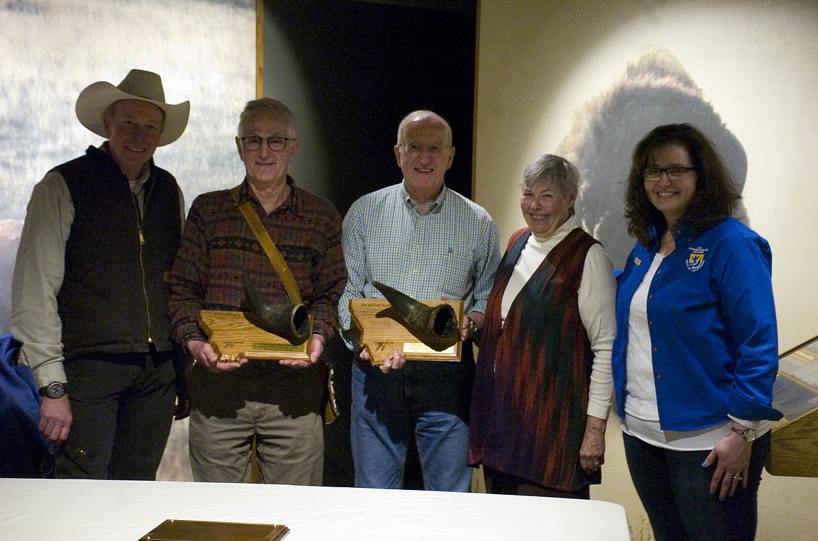 National Bison Range officials presented a Wisconsin trio with mounted bison horns in recognition of their donation of a wood carving. From left: Project Manager Jeff King, wood carver John Sharp, donors Jim and Barbara Kackley and U.S. Fish and Wildlife Service Program Specialist Laura King.