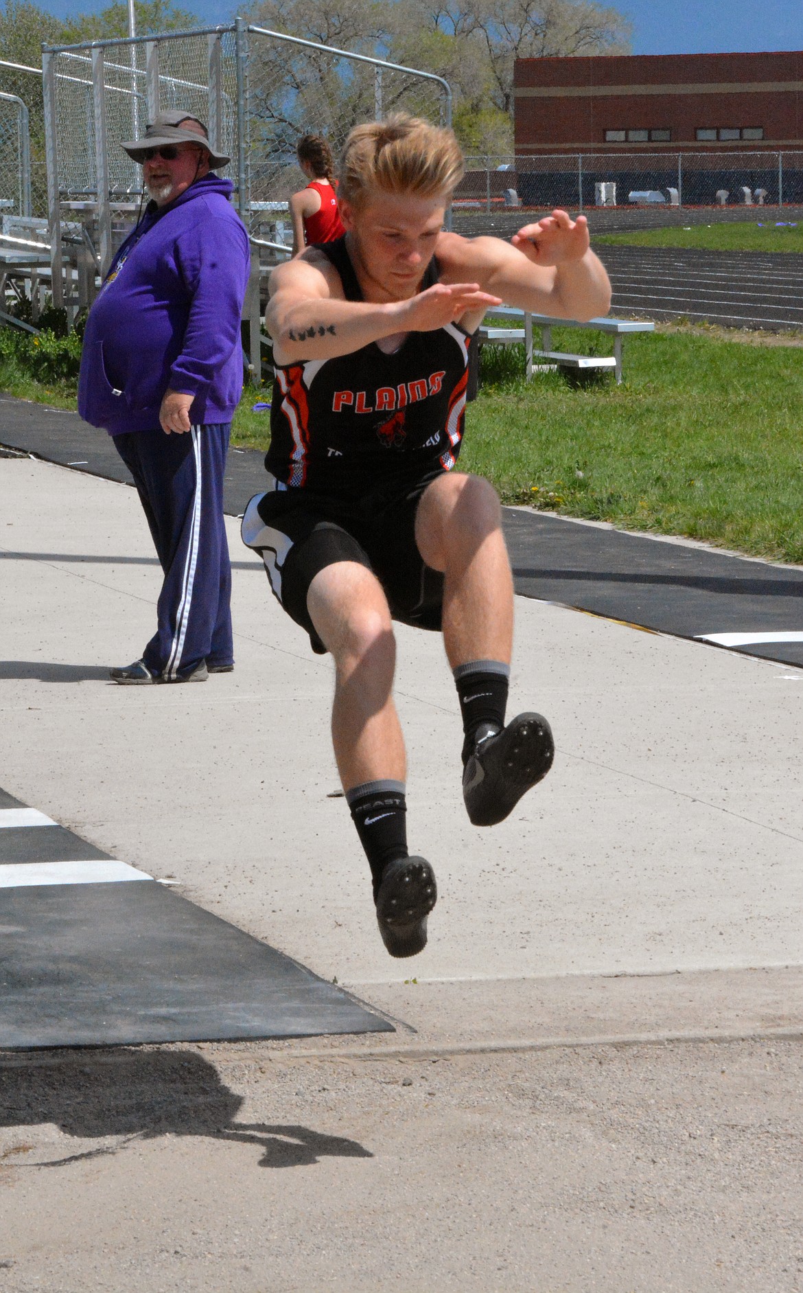 A MEMBER of the Plains track team competes at Polson High School. (Clark Fork Valley Press photos)