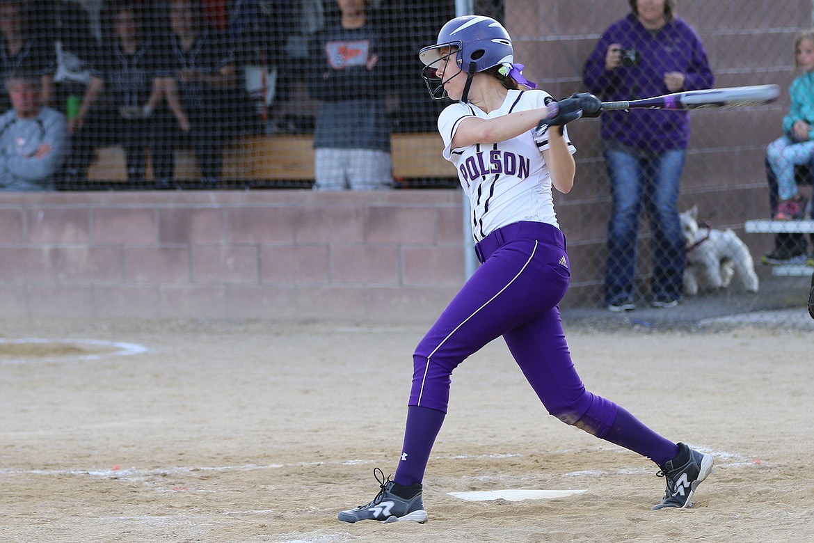 POLSON LADY Pirate Hannah Fryberger drives a Frenchtown pitcher offering into the outfield for a double in the Lady Pirates 6-5 loss to Frenchtown Saturday at Frenchtown High School. (Photo courtesy of Bob Gunderson)