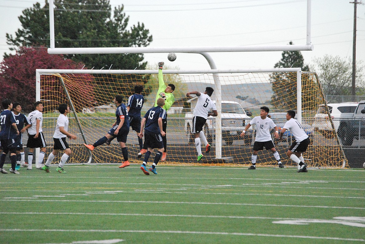 Bob Kirkpatrick/The Sun Tribune - Knights keeper CJ Quintero turns back a scoring threat from Naches in first half action.